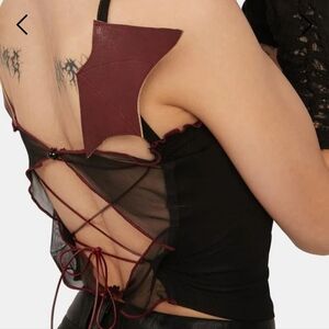 Edgy Lace-Up Top with Bat Wing Detail By Dark In Love